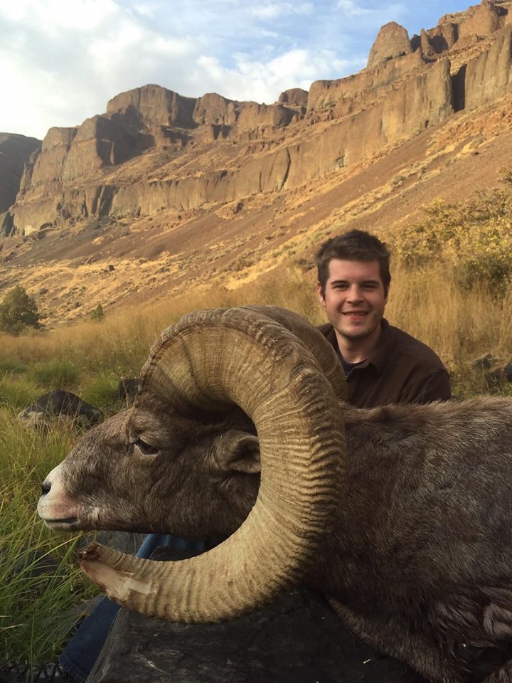 Clay Woodmark displays a Ram taken in the West John Day Unit #1. Woodmark's Ram was a taken during a trip guided by Kyle Buschelman and Jake Adams of Willamette Valley Outfitters