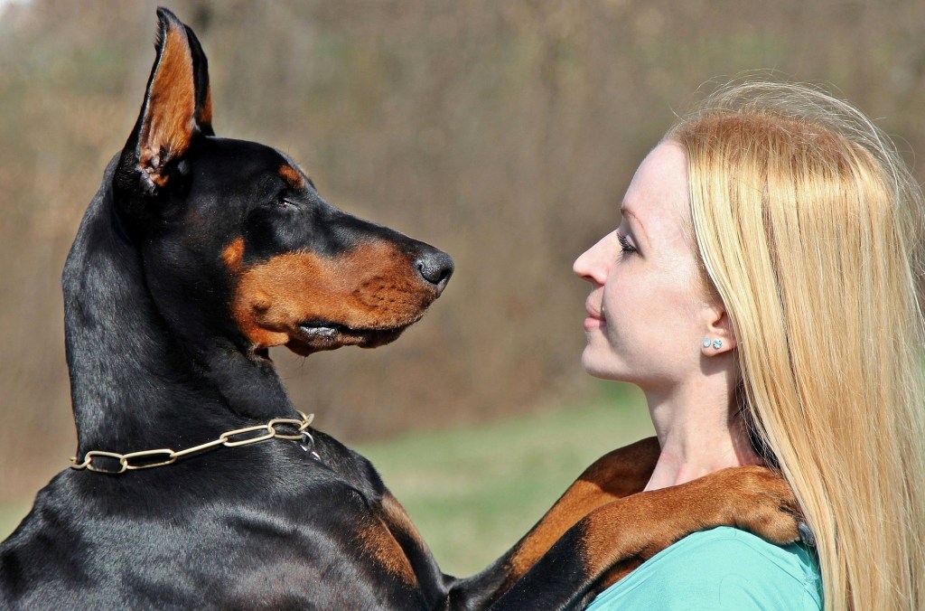 Woman with Doberman