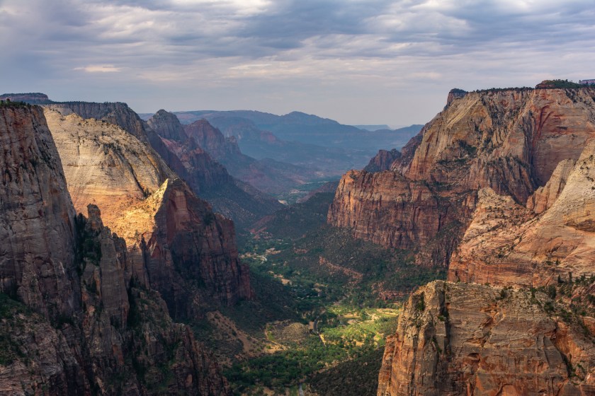 Looking out from Observation Point over Zion Canyon with views of Angels Landing and the Zion scenic drive. Zion National Park, Utah, USA.