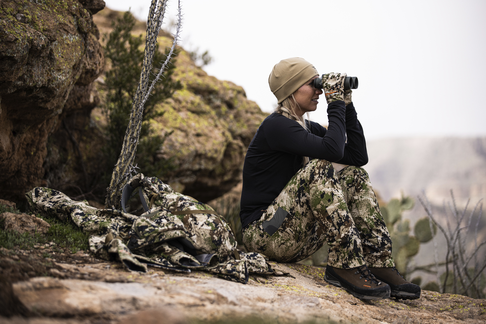 female hunter scouting