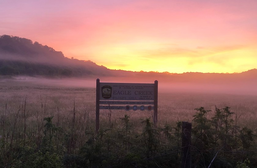 Eagle Creek sign at sunset.