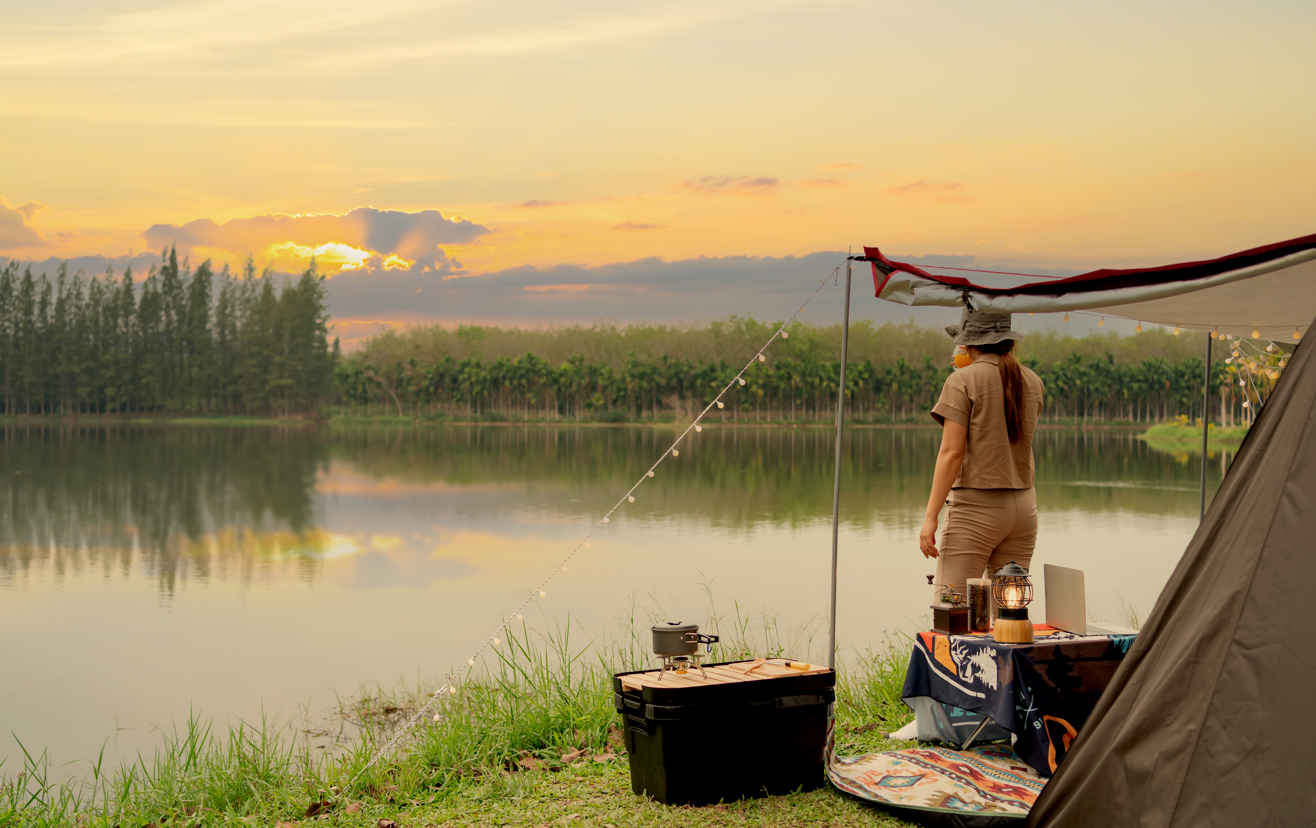 Homesteading tent on a lake.