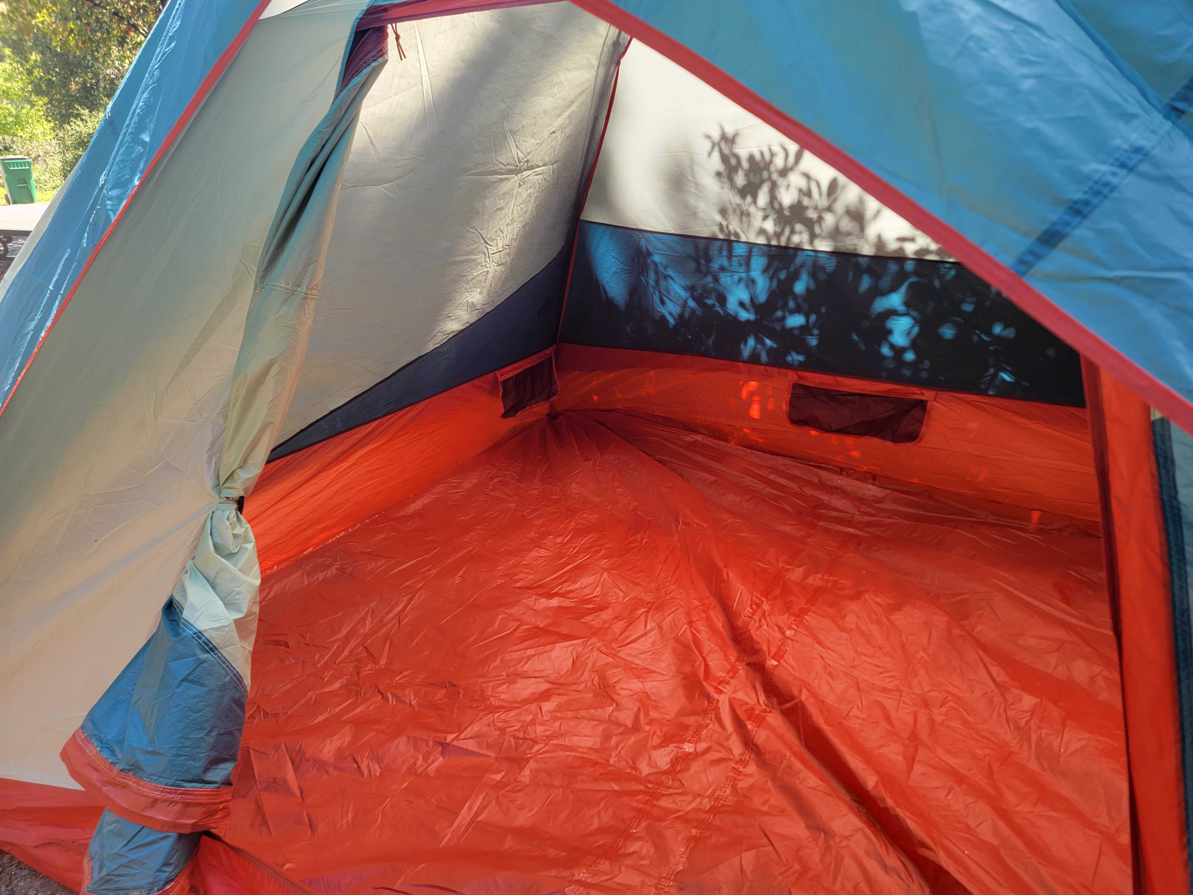 Kelty Discovery Basecamp 6 interior with mesh pockets on all sides of the tent