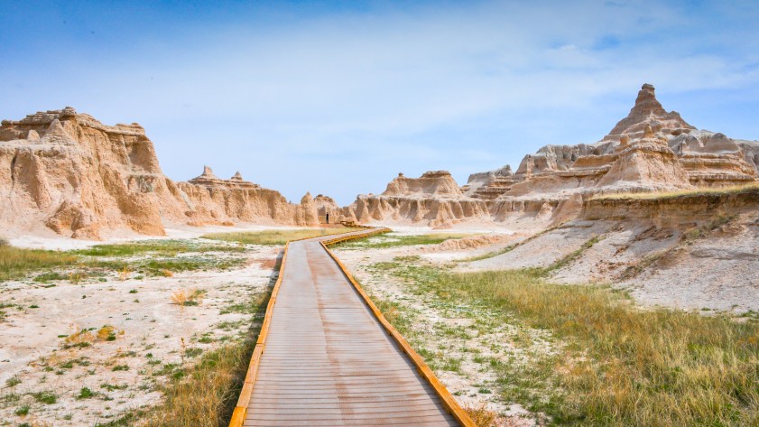 Wheelchair-accessible walking path through rock formations in Badlands National Park