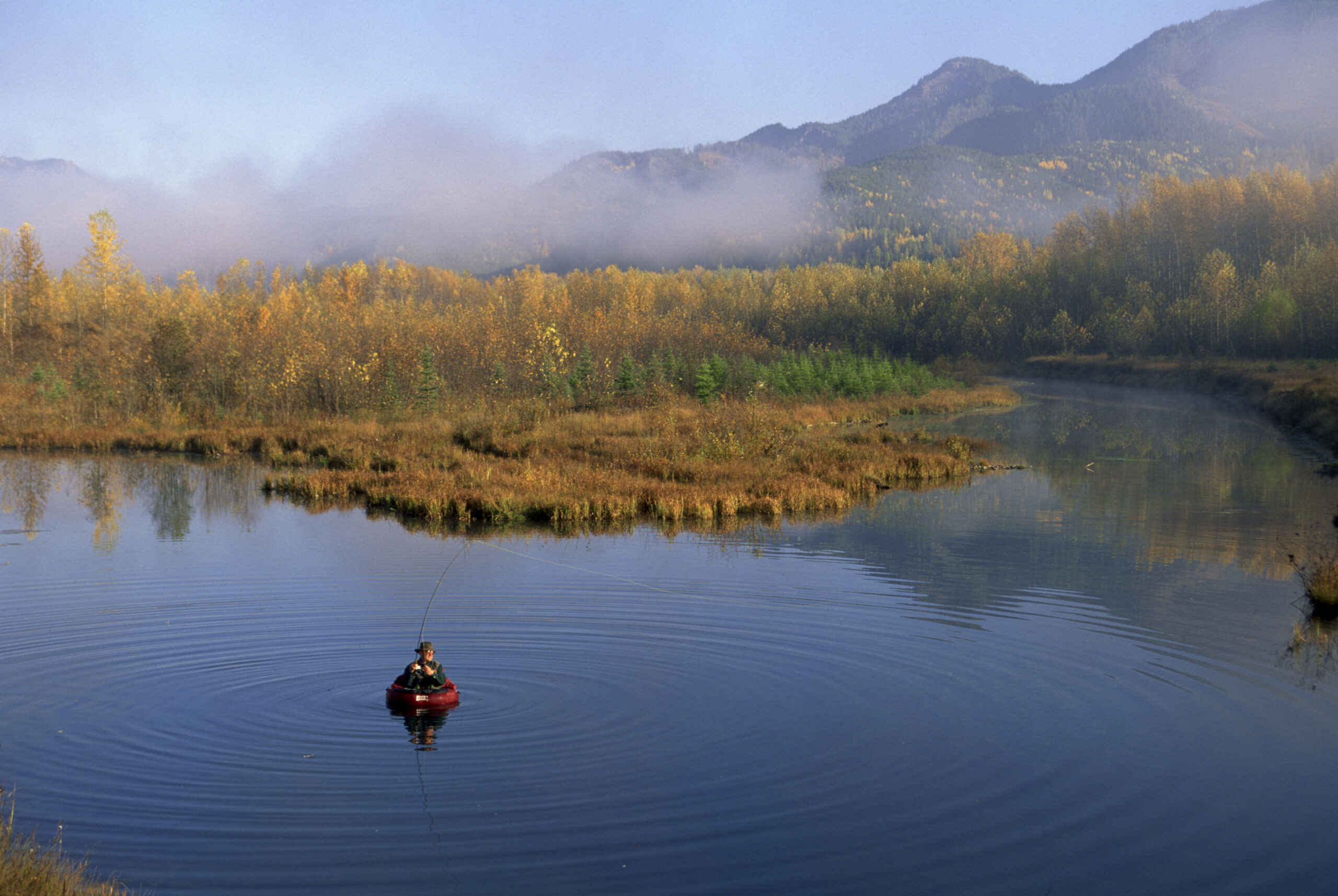 man flyfishing british columbia
