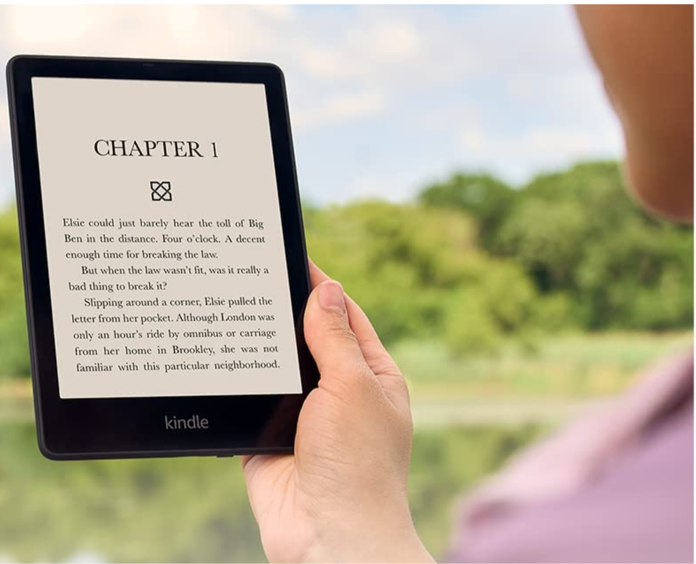 Person holding an Amazon Kindle 