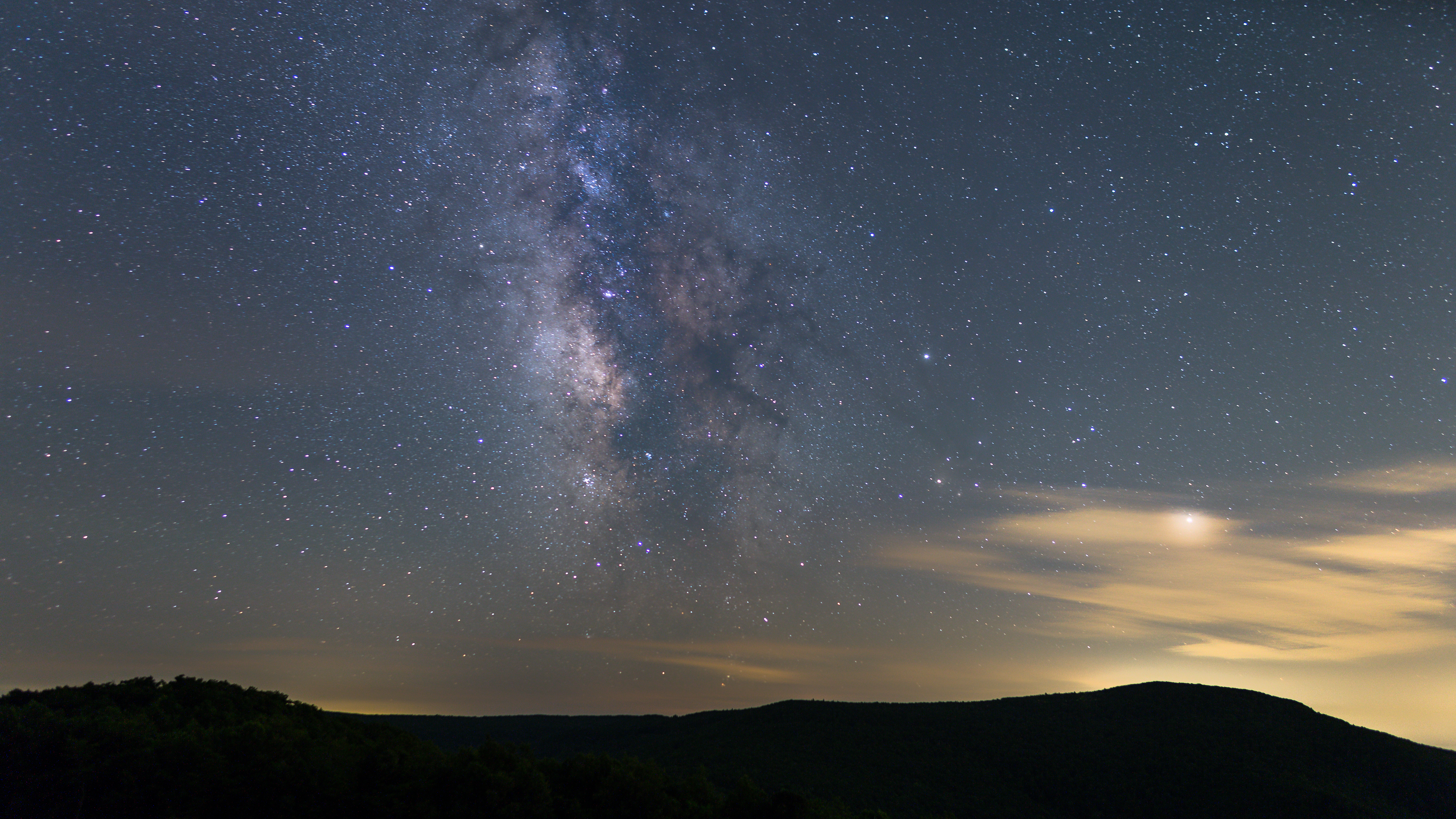 The Milky Way - along with Saturn and Mars - shine bright above the Blue Ridge Mountains in Shenandoah National Park