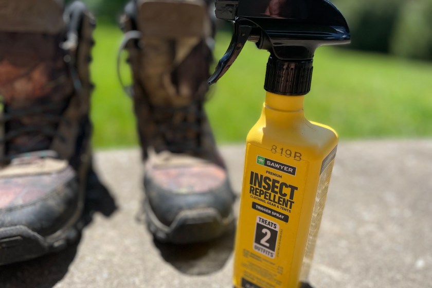 A yellow bottle of Sawyer Fabric Treatment
