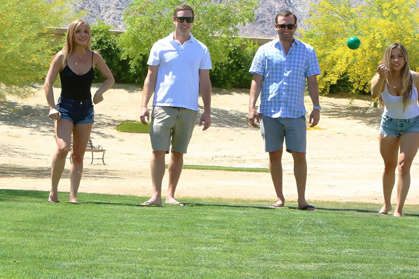 Two couples playing Bocce