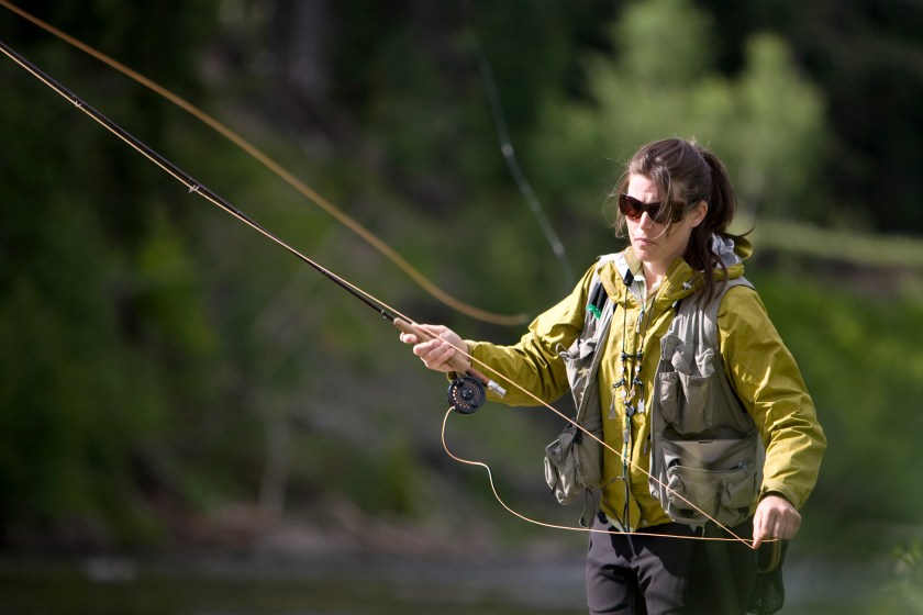 Woman fly fishing in British Columbia.