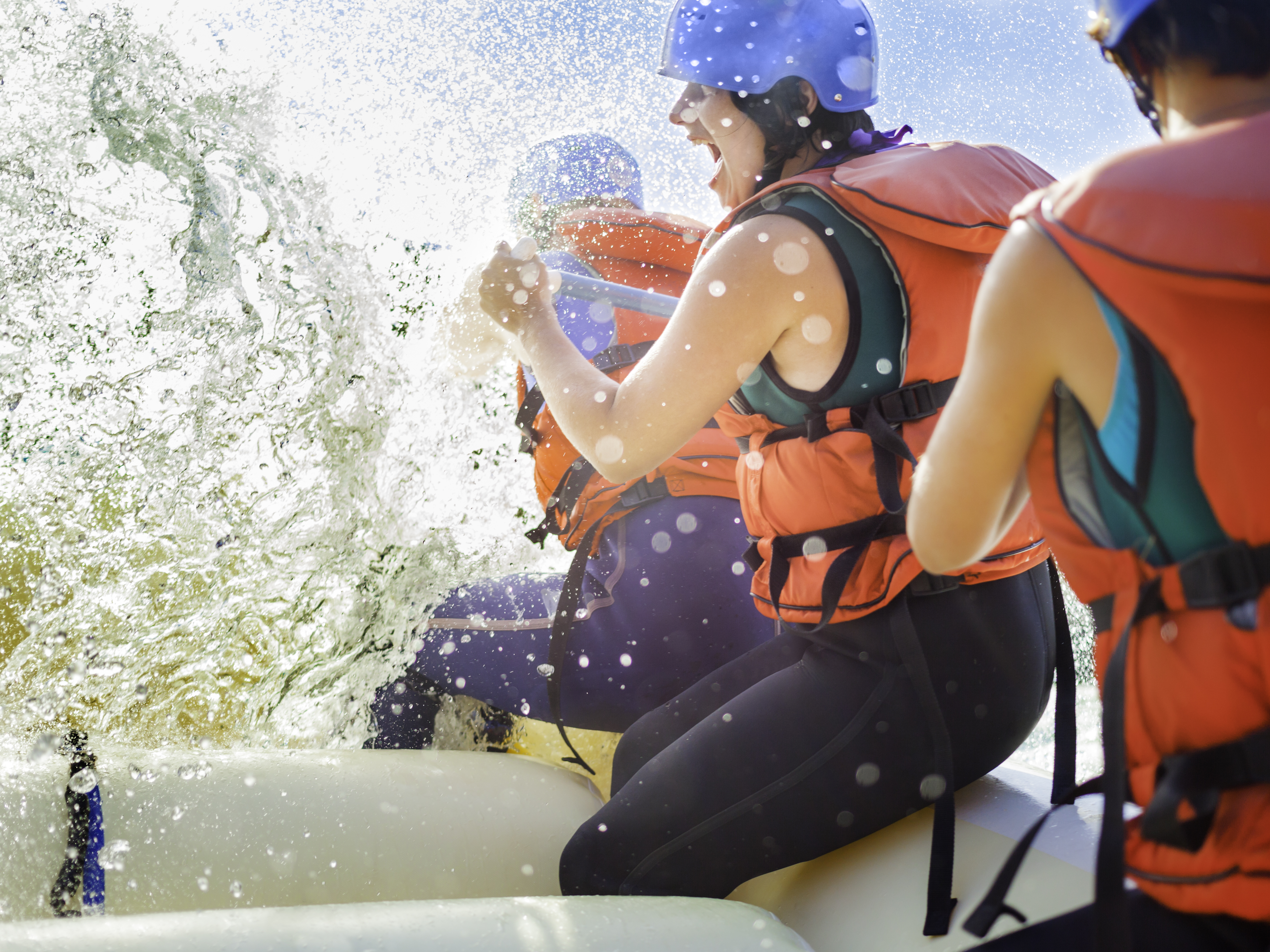 Getting splashed while whitewater rafting