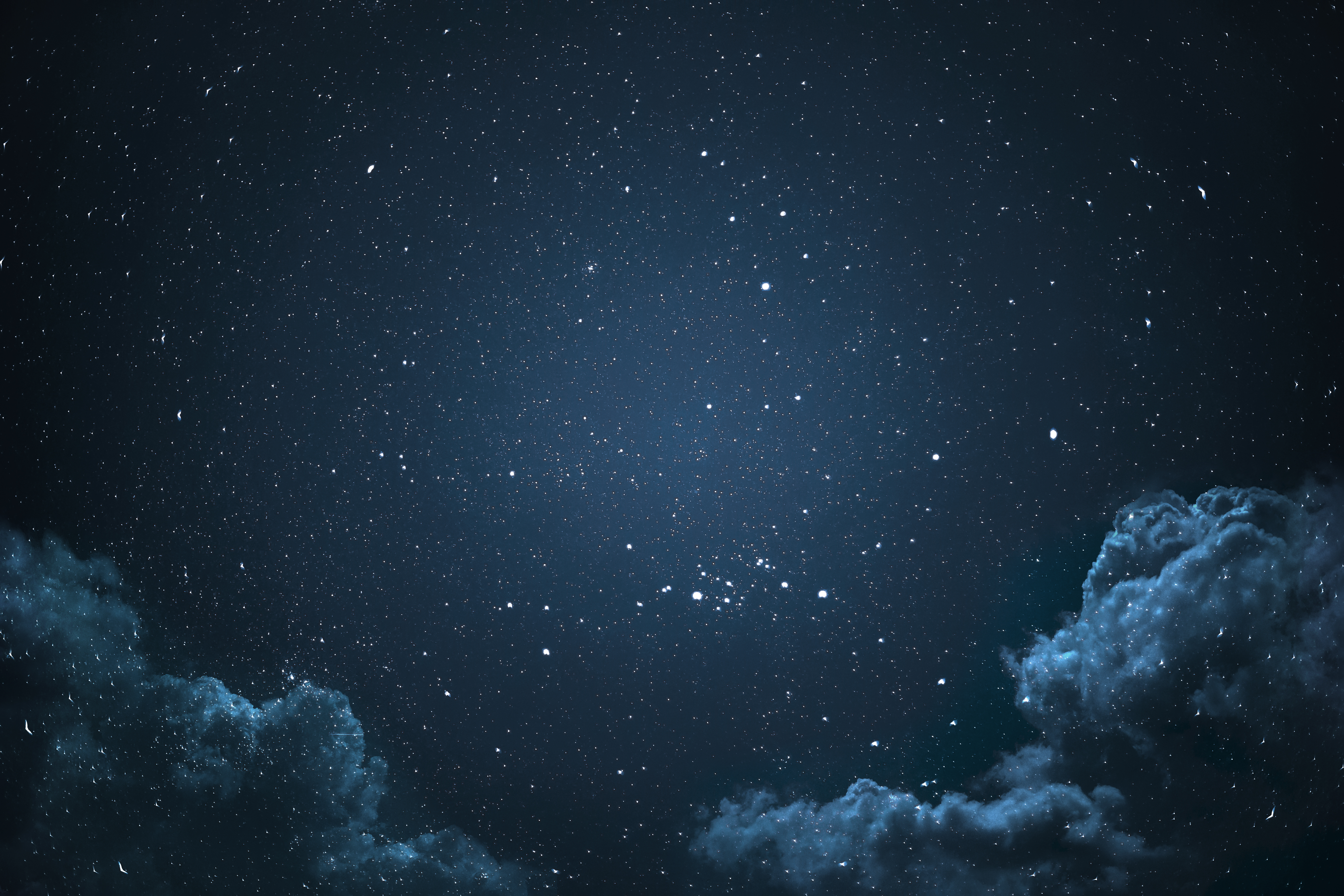 Night sky with stars and clouds. 