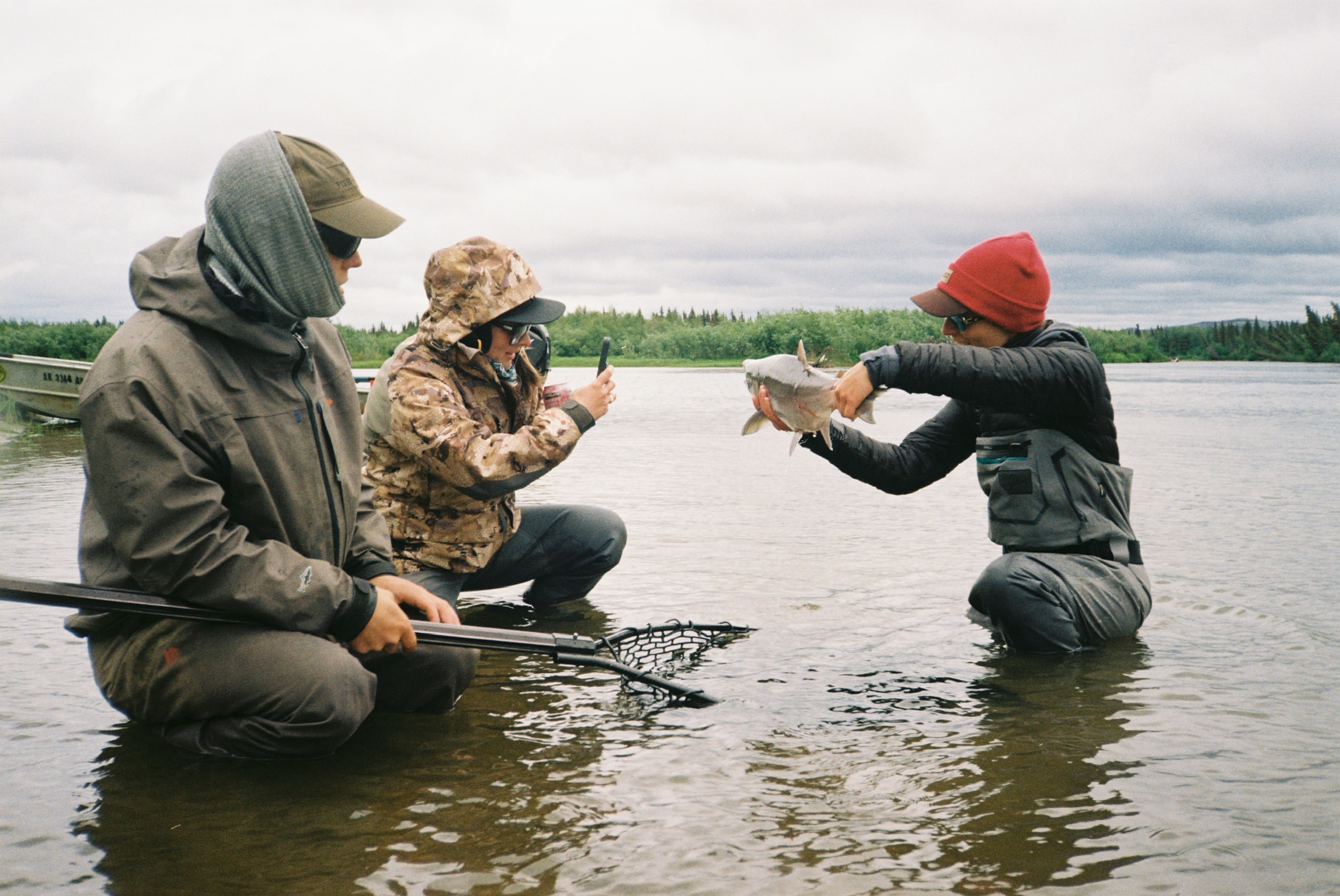 taking pictures of fish in alaska