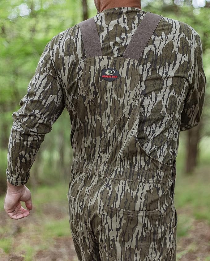 Person wearing Mossy Oak overalls