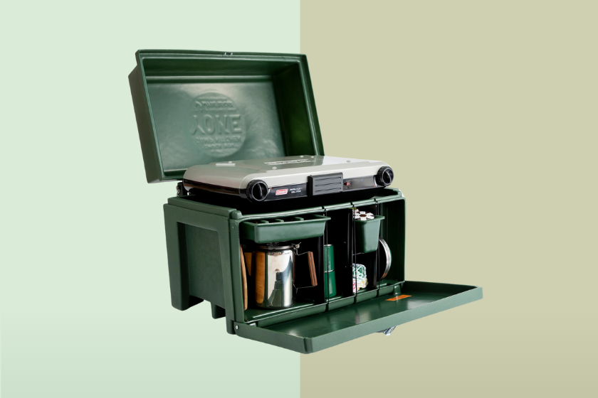 A green box with tools inside of it on a green background
