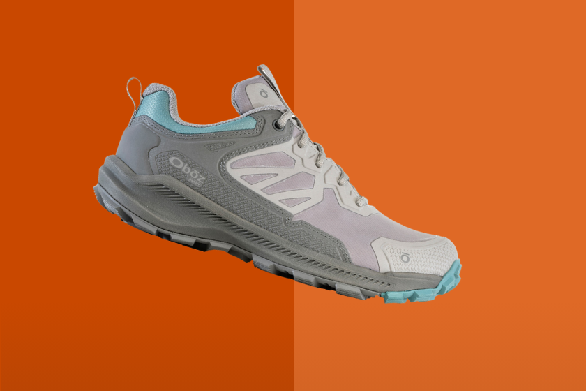 Running shoes on top of an orange background