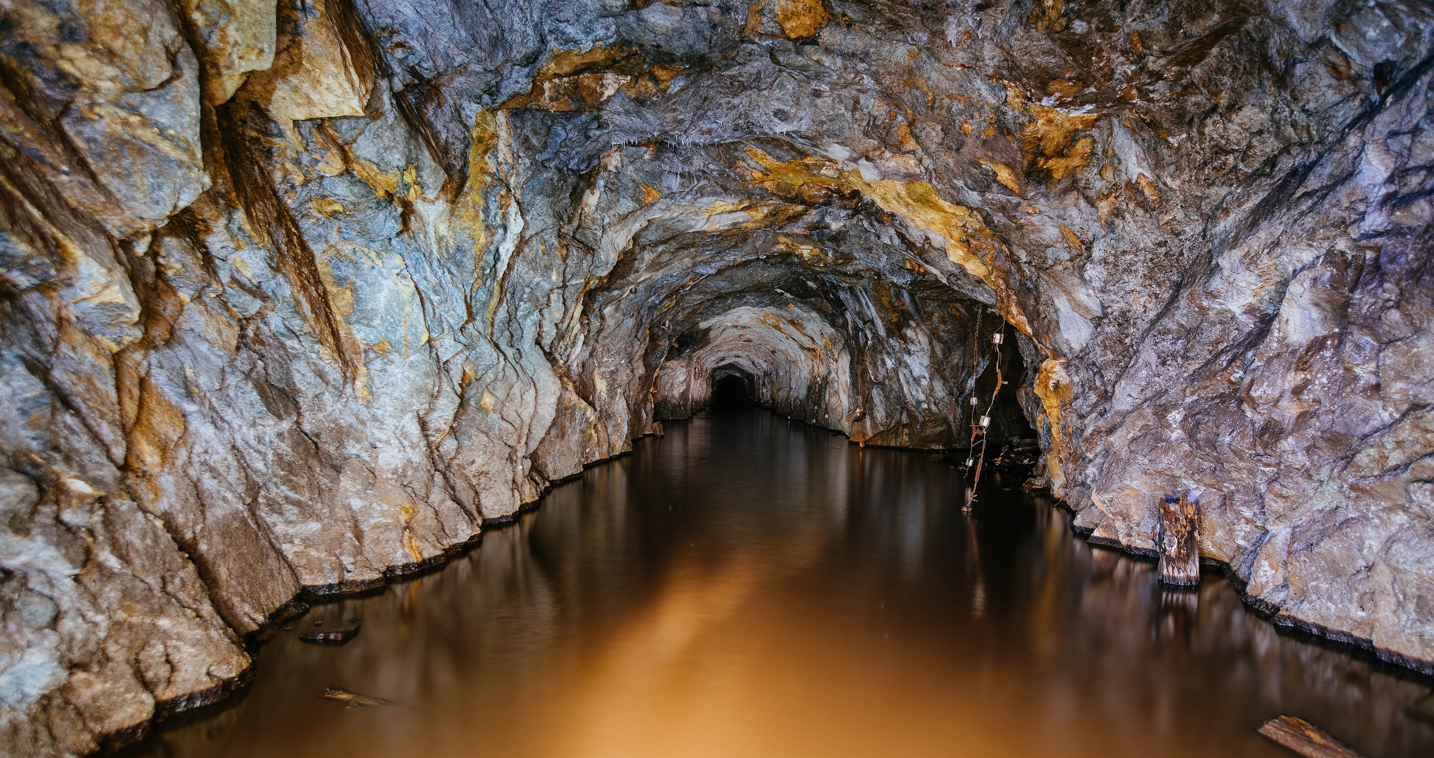 rush to save workers trapped in flooded coal mine