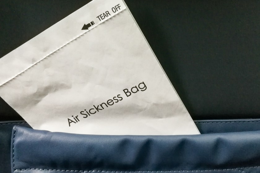 airplane seat pocket and sickness bag