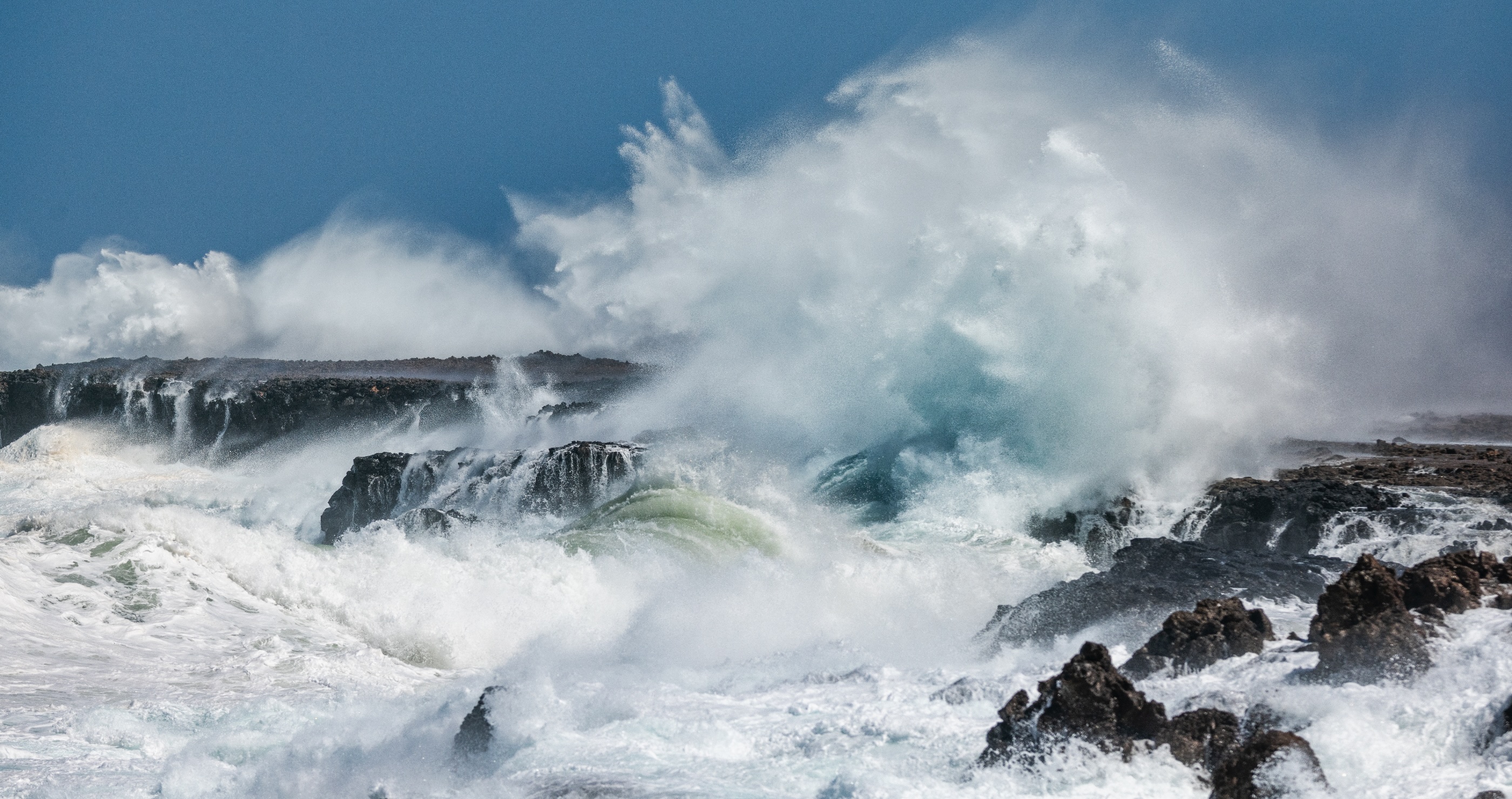 Insane Footage Shows The Moment That Beachgoers Get Pummeled By A Massive Wave