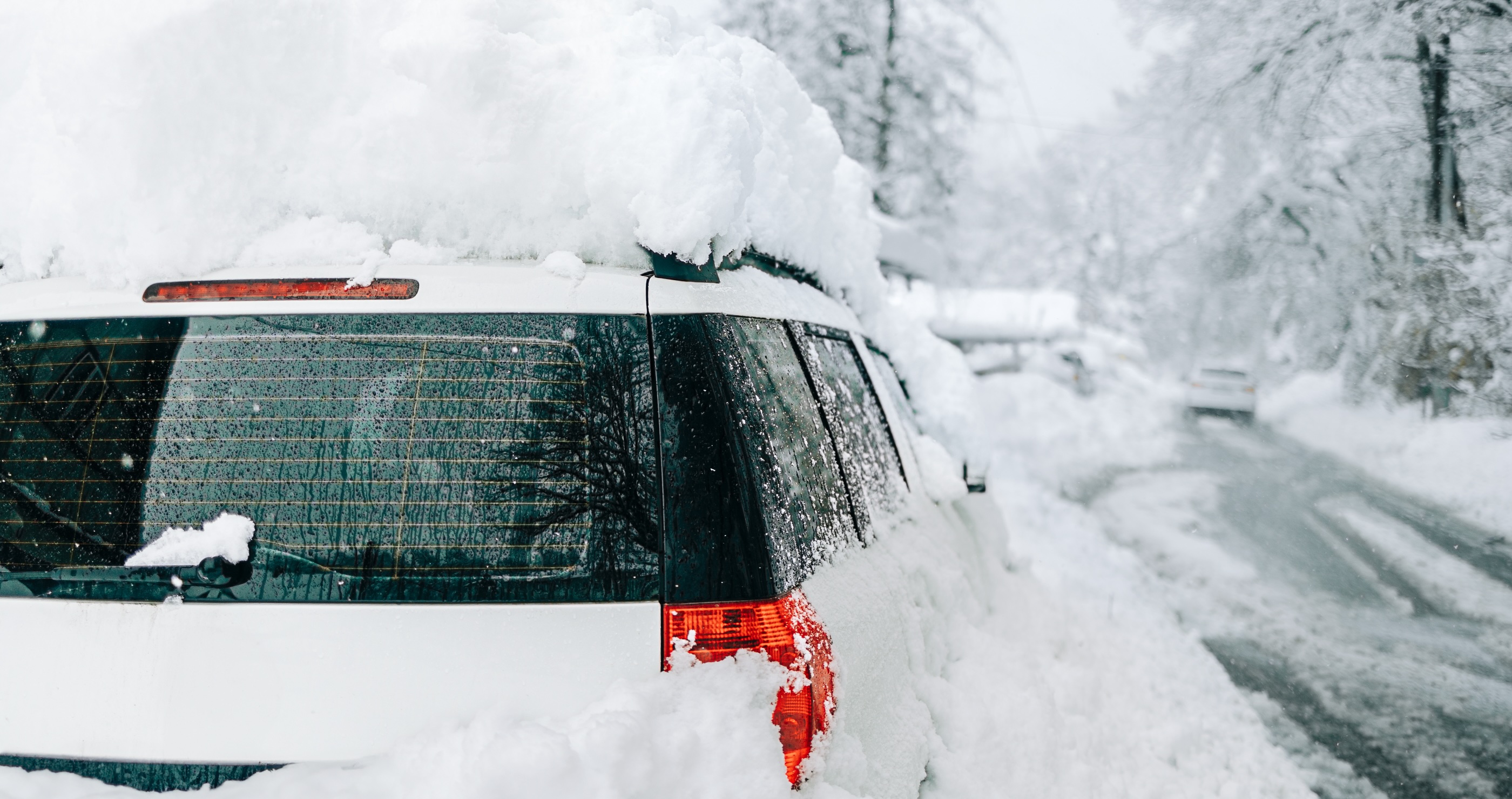 People Rage At Rhode Island Driver Who Drove With A Mountain Of Snow Atop Their SUV